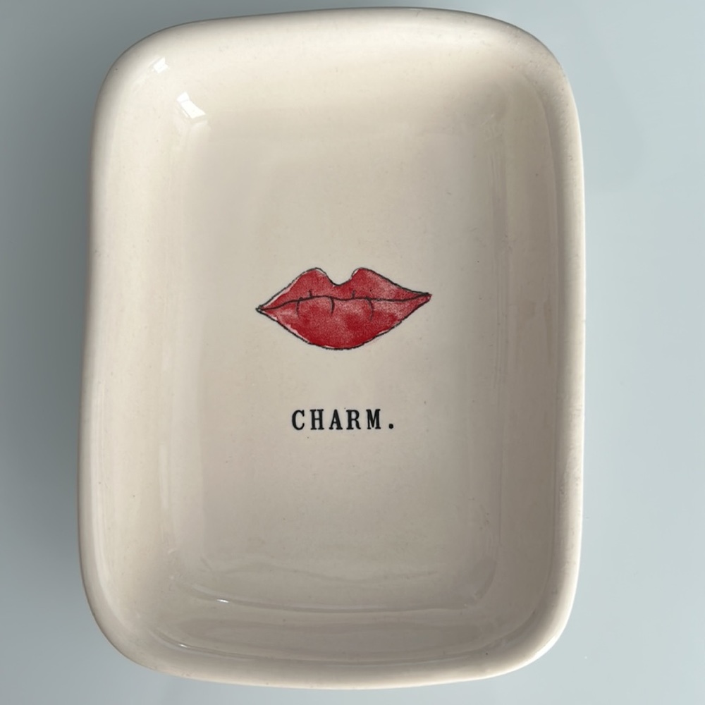 Rae Dunn trinket dish “CHARM.”